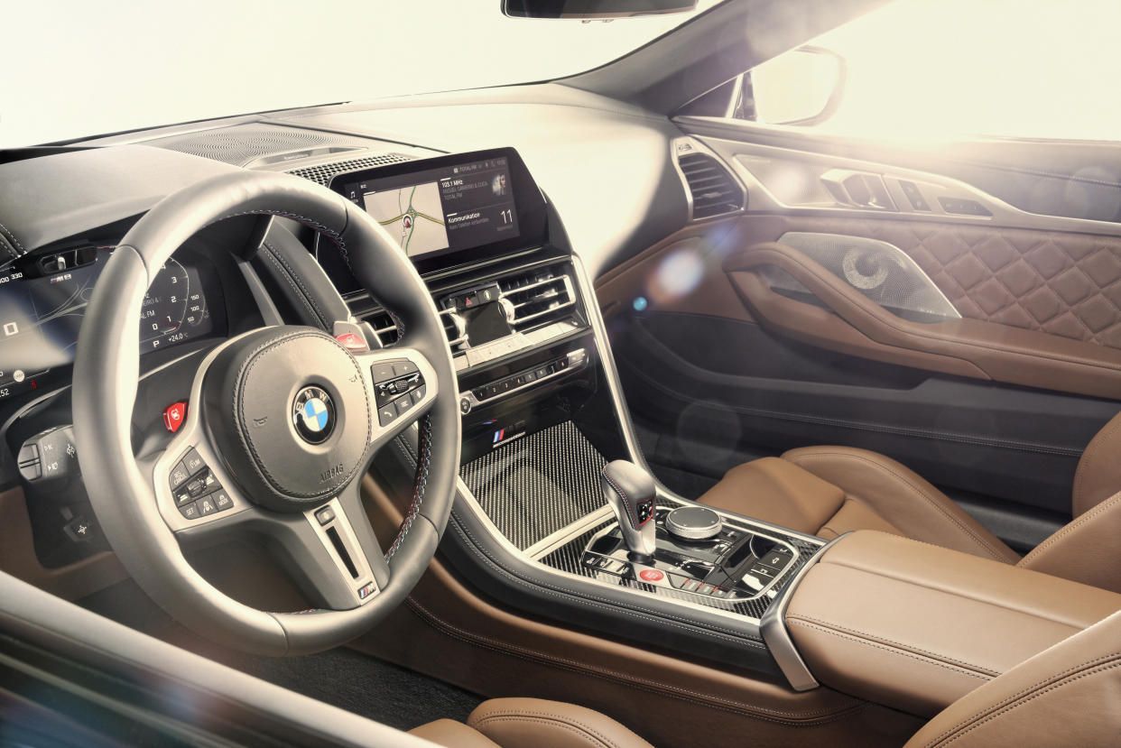 The interior gets various tweaks over the regular 8 Series cabin