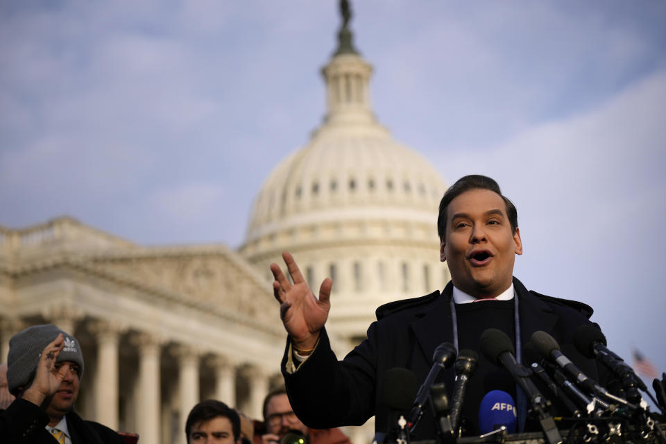 Rep. George Santos talks to reporters outside the Capitol on Nov. 30, 2023.  / Credit: Drew Angerer/Getty Images