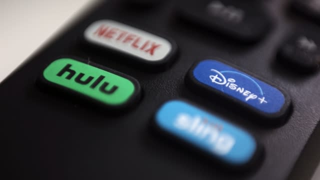 A remote shows different streaming services.