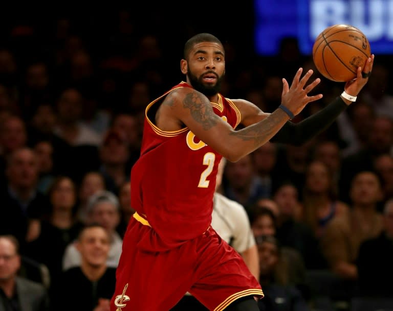 Kyrie Irving of the Cleveland Cavaliers grabs the loose ball in the first half against the New York Knicks at Madison Square Garden