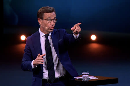 Ulf Kristersson, leader of the Moderate Party during a party leader duel with Stefan Lofven, leader of the Social Democratic Party, broadcast by Sweden's tv-channel TV4 from Linkoping, Sweden September 8, 2018. TT News Agency/Anders Wiklund/via REUTERS