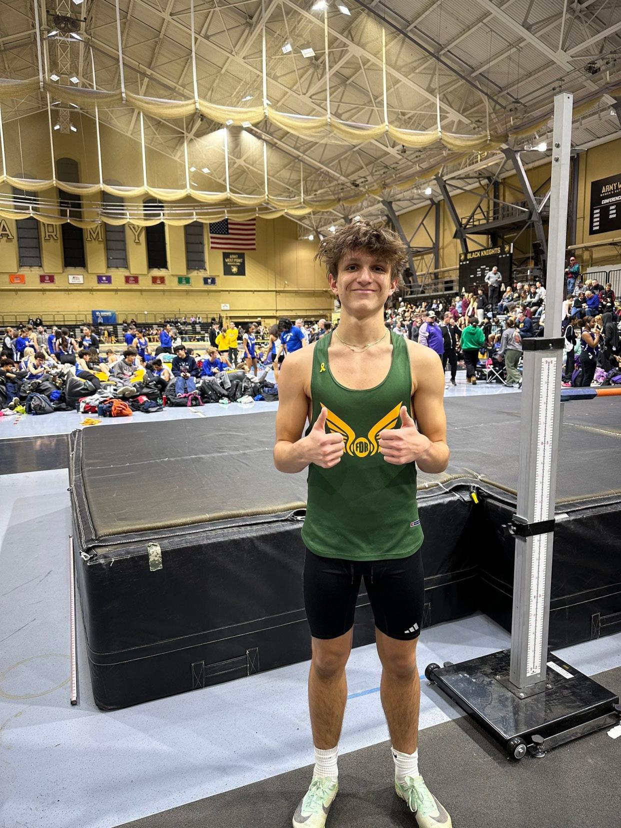 Roosevelt's Noah Tarkos poses after setting a program record in the high jump at the the OCIAA Developmental "A" Meet on Dec. 9, 2023 at West Point.