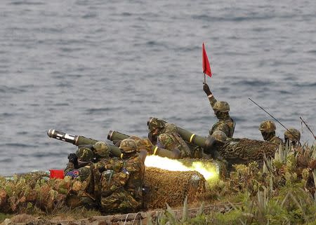 Soldiers fire Javelin missiles during the annual Han Kuang military exercise in Penghu, west of Taiwan, in this April 17, 2013 file photo. REUTERS/Pichi Chuang/Files