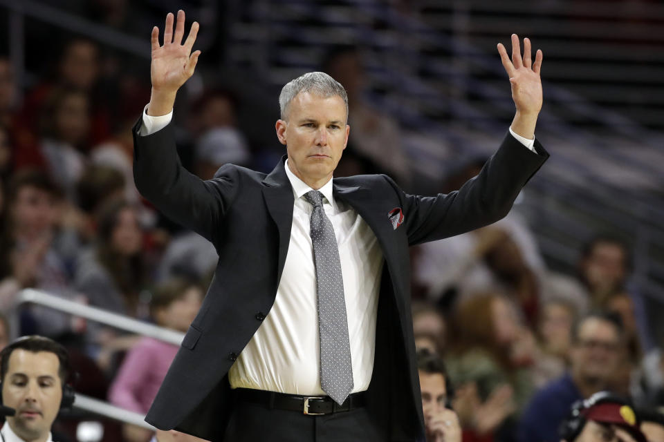 FILE - In this Feb. 15, 2020, file photo, Southern California coach Andy Enfield calls a play during the second half of the team's NCAA college basketball game against Washington State in Los Angeles. Entering Enfield’s eighth year, the Trojans have not been to the NCAA Tournament since 2017. That is when they fell just short of the Sweet 16 in their second appearance under him. (AP Photo/Marcio Jose Sanchez, File)