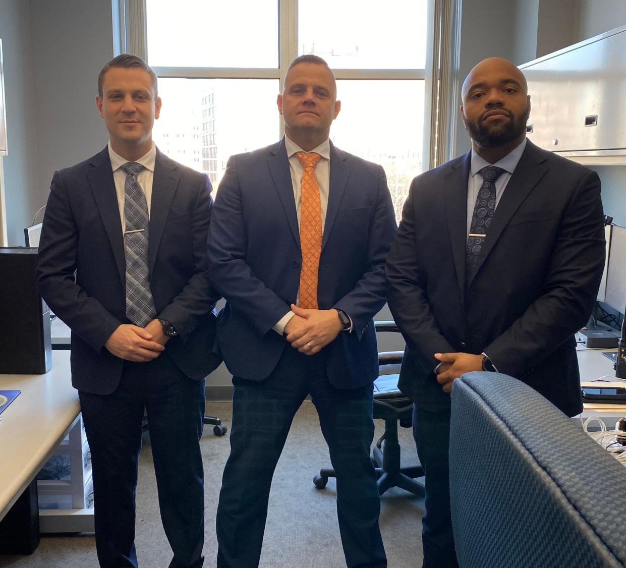 Detective Mitchell Guerra, Detective Sgt. Jonathan Primiano and Detective Joseph Nezier, from left, make up the Providence Police Department's new Digital Intelligence Unit, which gleans evidence from computer hard drives, seized cellphones, video, social media and other sources.