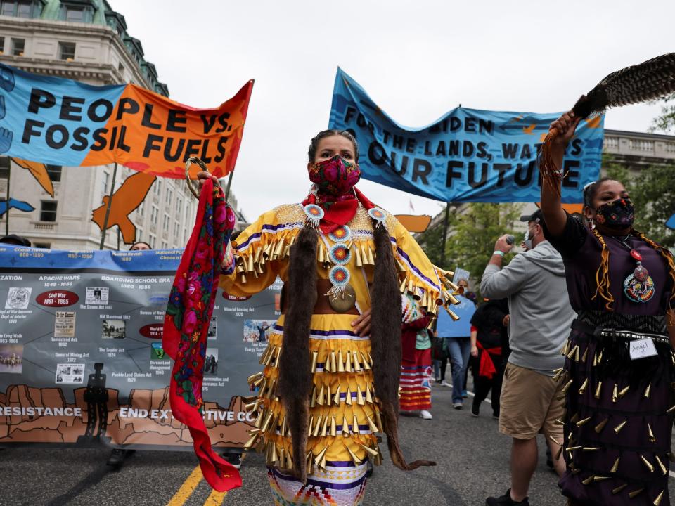 Indigenous activists march outside The White House protesting climate action (10/11/2021)