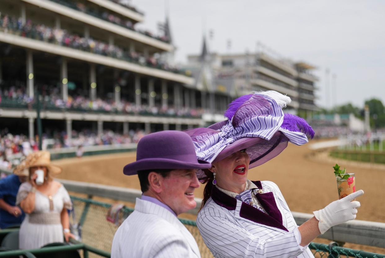 Louisvillians Carrie and Jeff Ketterman attend the Kentucky Derby Saturday at Churchill Downs in Louisville, Ky. It was Carrie's 25th, and she designs her own hats which she sells to help pay for Derby tickets for her and Jeff. May, 6, 2023.
