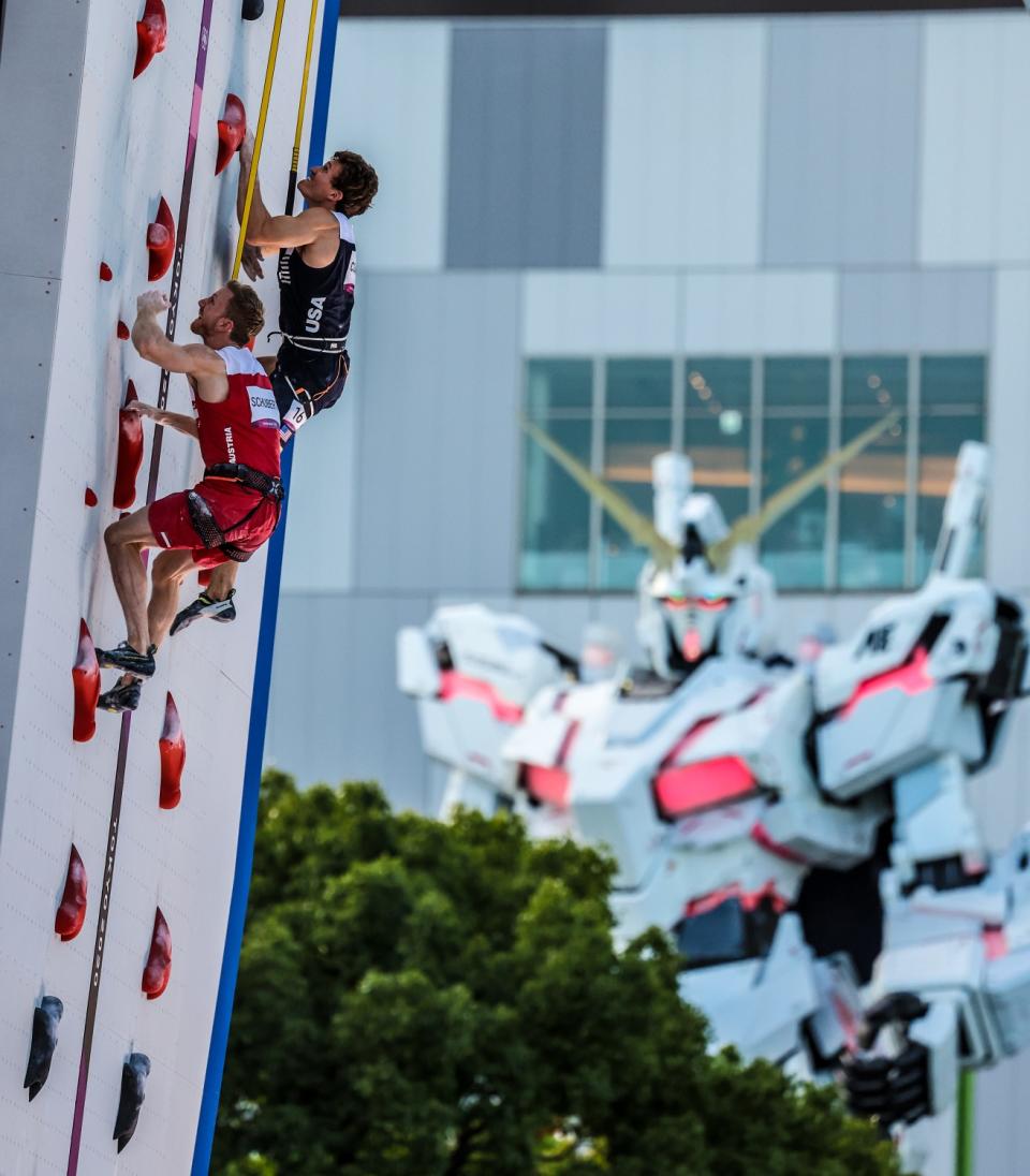 USA climber Nathaniel Coleman has a slight lead over Austria's Jakob Schubert in the Speed Finals.