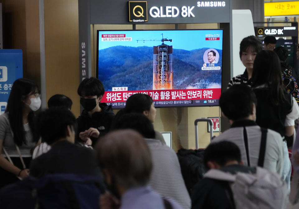 A TV screen shows a file image of North Korea's rocket launch during a news program at the Seoul Railway Station in Seoul, South Korea, Wednesday, May 31, 2023. North Korea said Wednesday that its attempt to launch the country's first spy satellite has failed. (AP Photo/Ahn Young-joon)