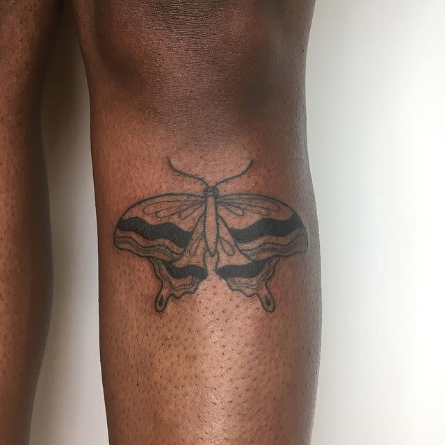 5) A Minimalist Moth Tattoo