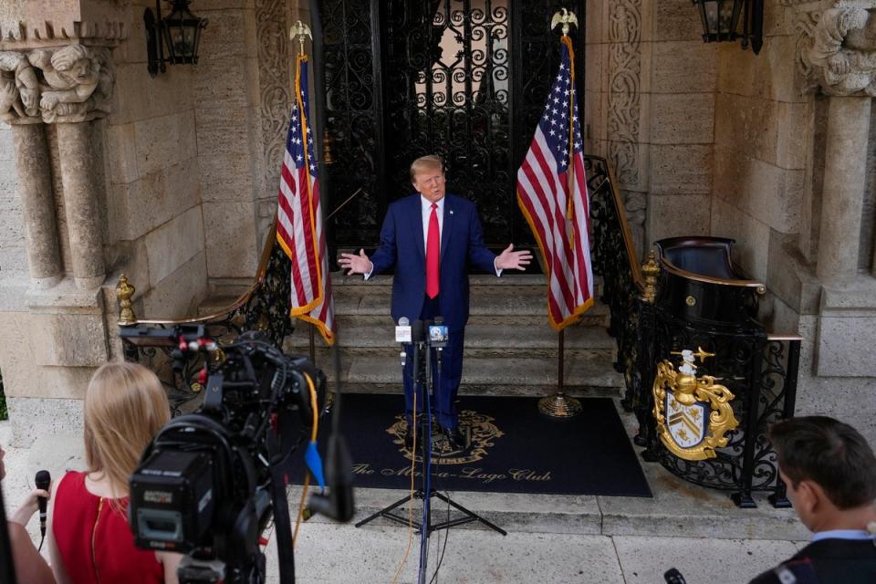 Trump speaks at his Mar-a-Lago estate on Thursday (AP)