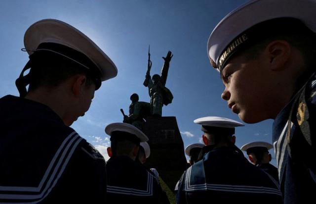 FILE PHOTO: Russian navy sailors attend a ceremony ahead of Victory Day in Sevastopol