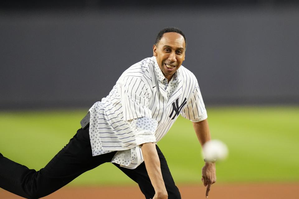 Stephen A. Smith throws out a ceremonial first pitch before the game between the Yankees and Blue Jays on Thursday in New York. (AP Photo/Frank Franklin II)