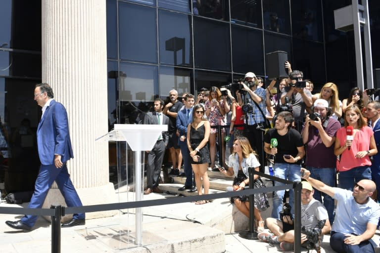 Members of the press gather outside a court in Pozuelo de Alarcon, in Spain, where Cristiano Ronaldo appeared, on July 31, 2017