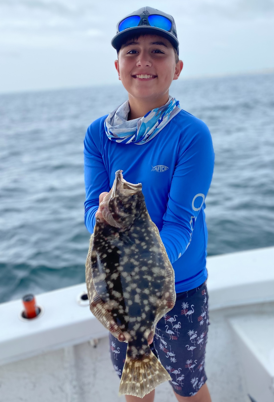 Walker Korey with a nice flounder he caught near Ponce Inlet aboard Capt. Jeff Patterson's Pole Dancer.