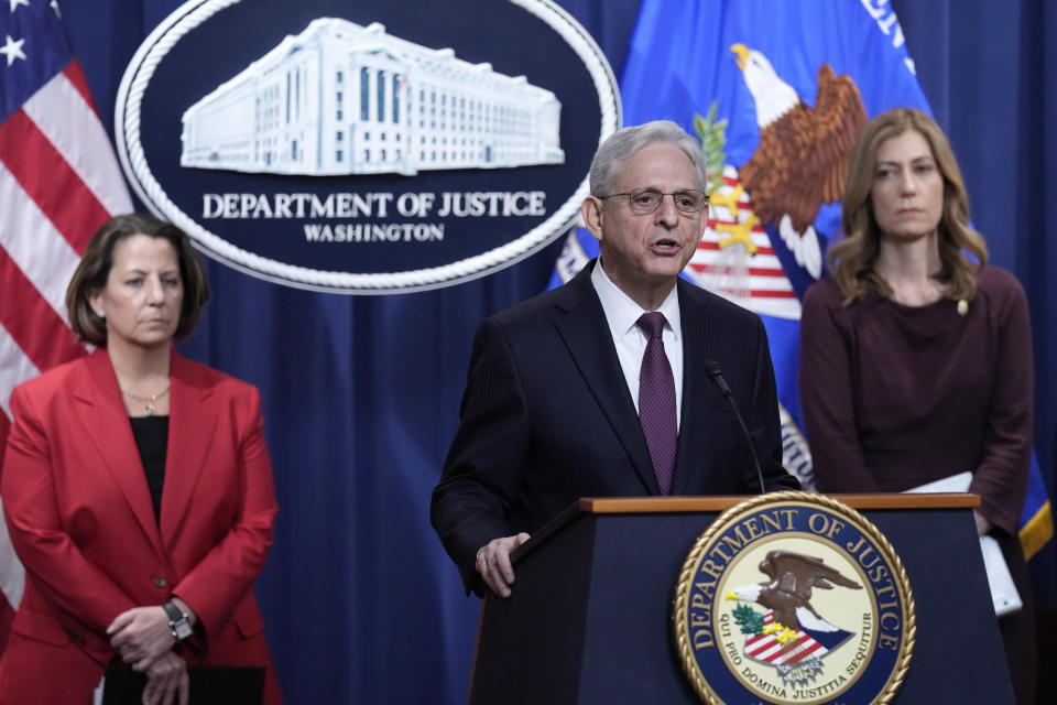 Attorney General Merrick Garland, center, speaks during a news conference at the Justice Department in Washington, Friday, April 14, 2023, on significant international drug trafficking enforcement action. Deputy Attorney General Lisa Monaco, left, and DEA Administrator Anne Milgram, right, listen. (AP Photo/Susan Walsh)