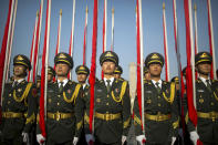 <p>Flagbearers of a Chinese honor guard stand in formation before a welcome ceremony for Argentina’s President Mauricio Macri at the Great Hall of the People in Beijing, Wednesday, May 17, 2017. (Photo: Mark Schiefelbein/AP) </p>