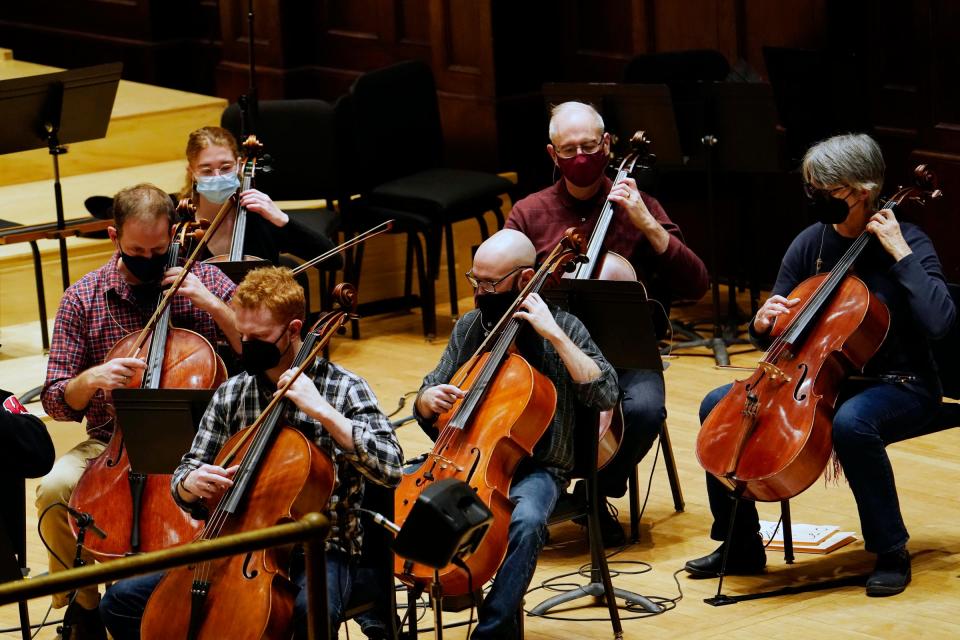 Members of the Detroit Symphony Orchestra work out a score for the documentary 'Gradually, Then Suddenly: The Bankruptcy of Detroit' with fellow members of the DSO in Detroit on Dec. 6, 2021.