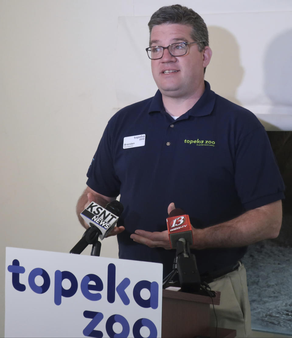 Brendan Wiley, director of the Topeka, Kansas, Zoo, speaks to reporters during a news conference, Tuesday, April 23, 2019, about a tiger attack that seriously injured a veteran zookeeper at the zoo in Topeka, Kan. Wiley says the zookeeper and the tiger should not have been in the open part of the tiger's enclosure at the same time and acknowledges that human error is probably to blame. (AP Photo/John Hanna)