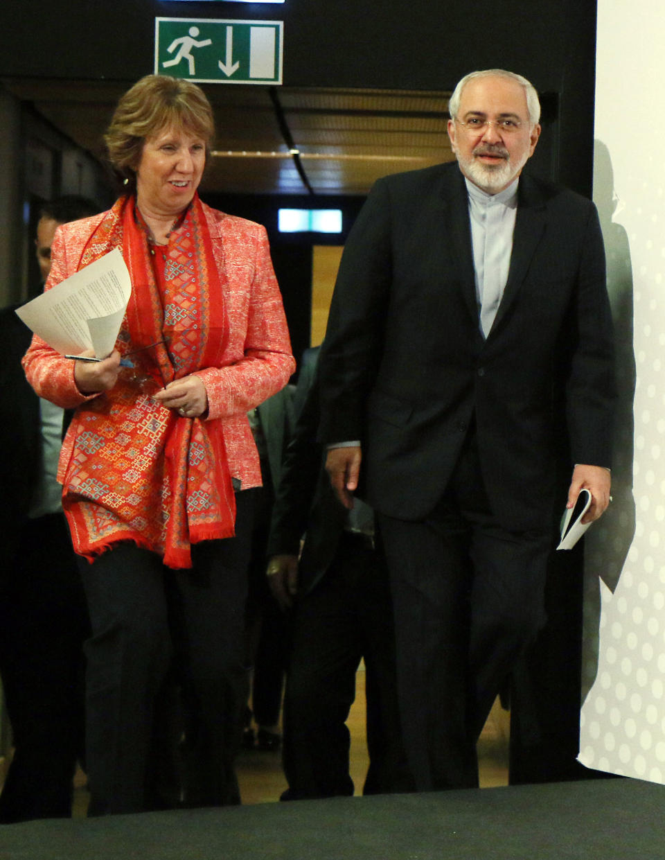 European foreign policy chief Catherine Ashton and Iranian Foreign Minister Mohamad Javad Zarif, from left, arrive to address the media after closed-door nuclear talks in Vienna, Austria, Wednesday, April 9, 2014. (AP Photo/Ronald Zak)