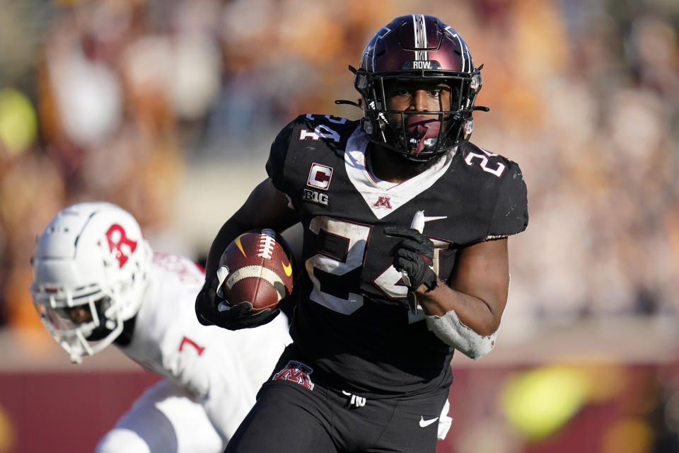 Minnesota running back Mohamed Ibrahim (24) runs for a touchdown during the second half of an NCAA college football game against Rutgers, Saturday, Oct. 29, 2022, in Minneapolis. (AP Photo/Abbie Parr)