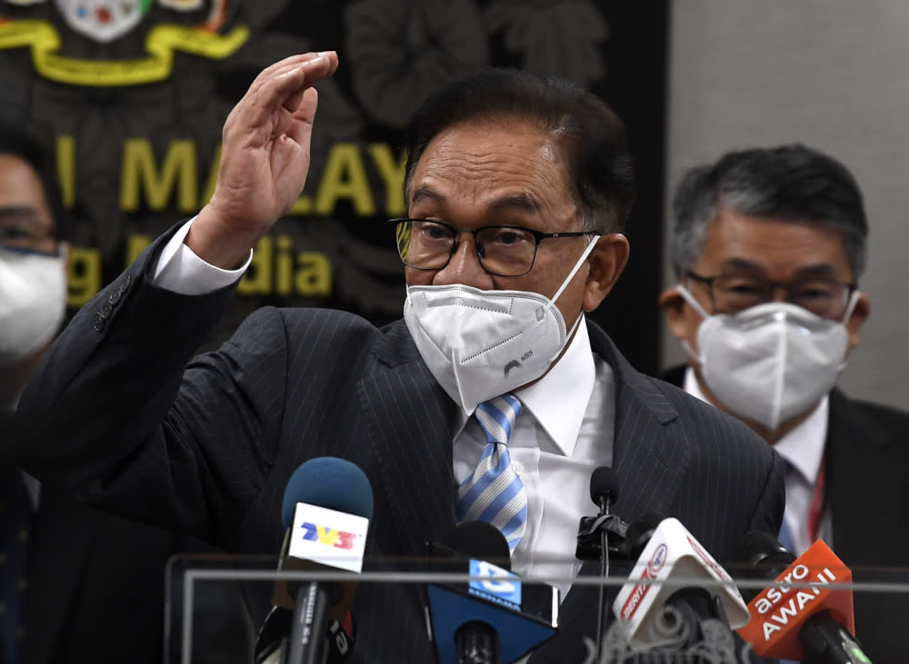 Opposition leader Datuk Seri Anwar Ibrahim speaking at a press conference at Parliament lobby, July 29, 2021. — Bernama pic