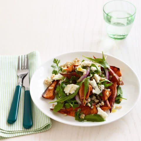 <p>Forget your basic table salad this Thanksgiving and switch up with this meaty sweet potato dish instead. </p><p><em><a href="https://www.womansday.com/food-recipes/food-drinks/recipes/a12846/roasted-sweet-potato-salad-barley-arugula-recipe-wdy1214/" rel="nofollow noopener" target="_blank" data-ylk="slk:Get the recipe for Roasted Sweet Potato Salad with Barley and Arugula.;elm:context_link;itc:0;sec:content-canvas" class="link ">Get the recipe for Roasted Sweet Potato Salad with Barley and Arugula.</a></em></p>