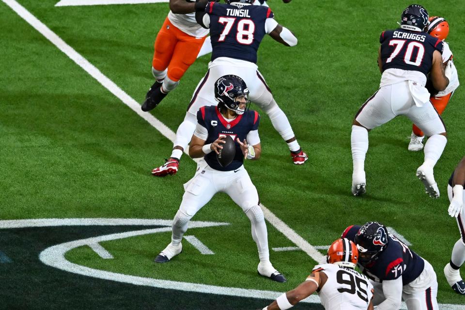 Houston Texans quarterback C.J. Stroud (7) looks to pass the ball against the Cleveland Browns during a wild-card playoff game Saturday in Houston.