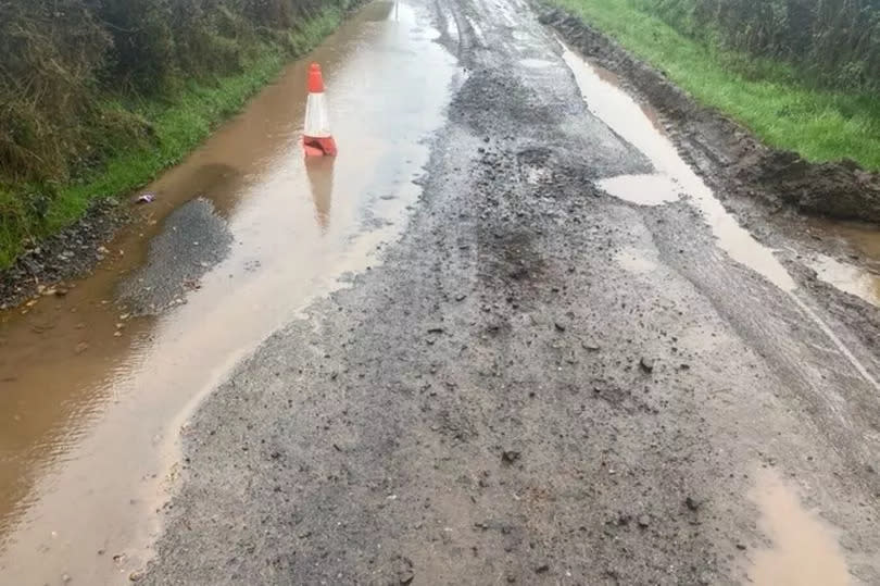 Potholes on the road into Templeton near Tiverton -Credit:Matthew Palmer