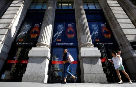 FILE PHOTO: Shoppers walk past the King William Street branch of House of Fraser in central London, Britain, June 22, 2018. REUTERS/Henry Nicholls/File Photo