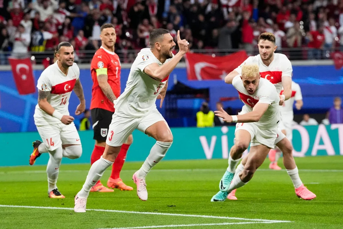 At the double: Merih Demiral scored twice to send Turkey into the quarter-finals of Euro 2024 (AP)