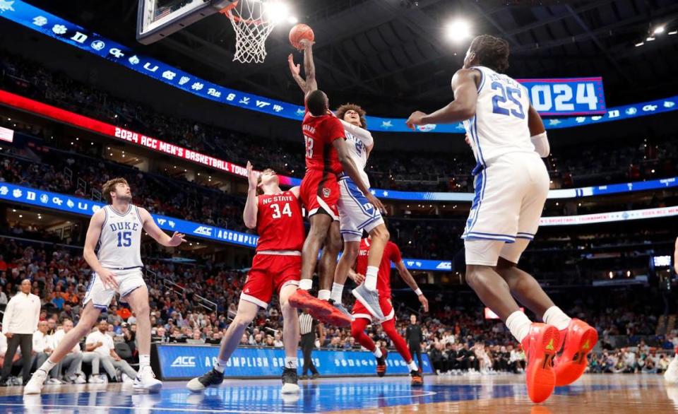 N.C. State’s Mohamed Diarra (23) blocks the shot by Duke’s Tyrese Proctor (5) during N.C. State’s 74-69 victory over Duke in the quarterfinal round of the 2024 ACC Men’s Basketball Tournament at Capital One Arena in Washington, D.C., Thursday, March 14, 2024. Ethan Hyman/ehyman@newsobserver.com