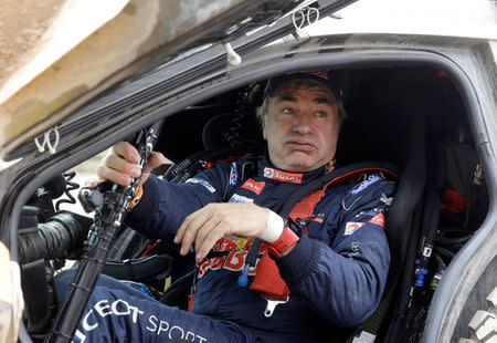 Dakar Rally - 2018 Peru-Bolivia-Argentina Dakar rally - 40th Dakar Edition stage eight, Uyuni to Tupiza - January 14, 2018. Carlos Sainz of Spain reacts. REUTERS/Ricardo Mazalan/Pool