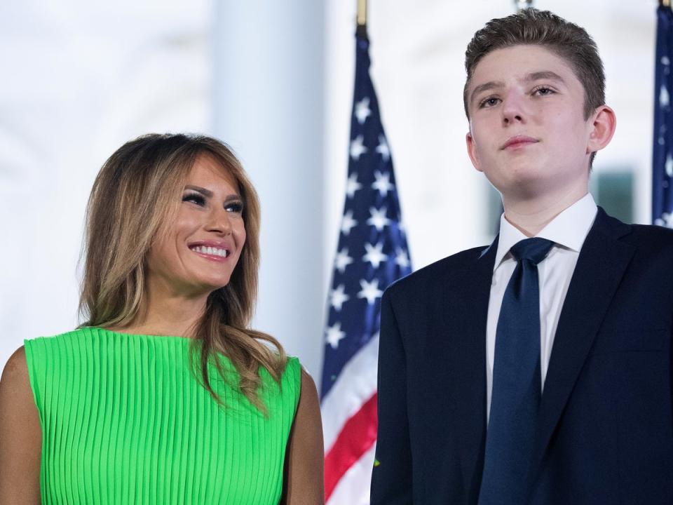 First lady Melania Trump (L) looks at her son Barron Trump after U.S. President Donald Trump delivered his acceptance speech for the Republican presidential nomination on the South Lawn of the White House August 27, 2020 in Washington, DC. (Getty Images)