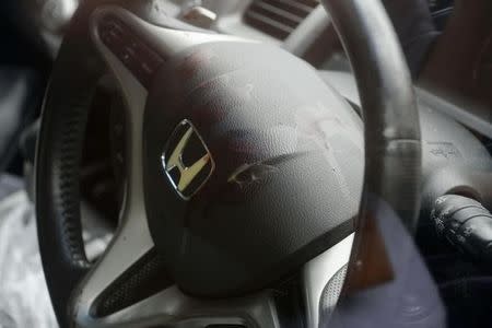 Blood on the steering wheel of a car, which a suspect drove to the police station after killing people at a facility for the disabled, is seen in Sagamihara, Kanagawa prefecture, Japan, in this photo taken by Kyodo July 26, 2016. Mandatory credit Kyodo/via REUTERS