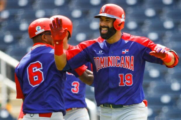 Orbit and Jose Bautista Play With Dolls — Wait, What?, by MLB.com/blogs