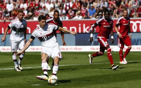 Football Soccer - FC Ingolstadt 04 v Bayern Munich - German Bundesliga - Audi Sportpark, Ingolstadt, Germany 07/05/16 Bayern Munich's Robert Lewandowski scores a penalty. REUTERS/Michaela Rehle.