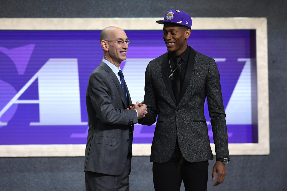 Hawks pick De'Andre Hunter had to greet NBA commissioner Adam Silver with a Lakers hat. (Getty Images)