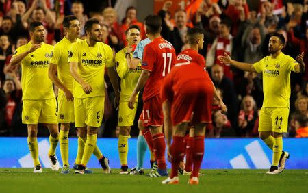 Britain Football Soccer - Liverpool v Villarreal - UEFA Europa League Semi Final Second Leg - Anfield, Liverpool, England - 5/5/16 Villarreal's Victor Ruiz is shown a red card by referee Viktor Kassai after receiving a second yellow card Reuters / Phil Noble Livepic