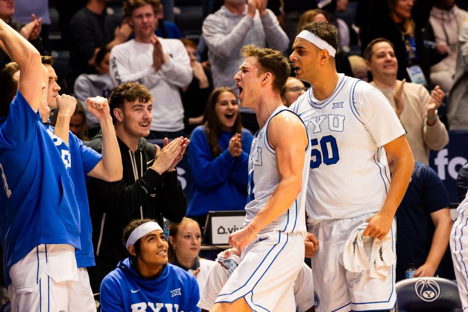 Brigham Young Cougars players celebrate from the bench after their victory 78-71 over Baylor University in a men’s college basketball game at the Marriott Center in Provo on Tuesday, Feb. 20, 2024. | Megan Nielsen, Deseret News