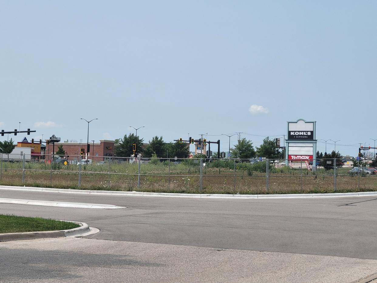 The vacant lot on the Forest Mall property between IHOP and Panera Bread was occupied by Firestone Auto Care until 2014. The building was demolished in 2020.