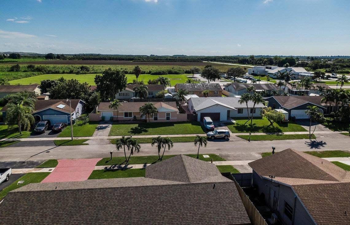 View of a neighborhood next to a field located at 26100 SW 112th Ave, Homestead. County officials, residents, and developers have fought to expand Homestead’s boundary into protected land.