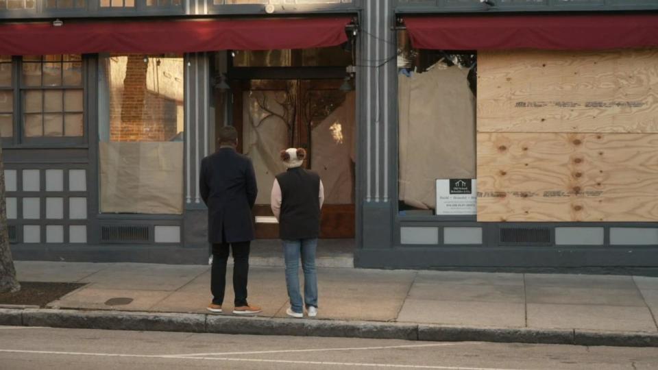 PHOTO: ABC News' Steve Osunsami and Inez Campbell-Easton look at the location that was once a bank owned by her ancestor. (ABC News)