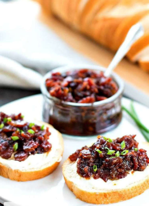 <p>Melissa's Southern Style Kitchen</p><p>Spread on crostini with cream cheese, on buttermilk biscuits or over warm goat cheese for a mouthwatering appetizer.</p><p><strong>Get the recipe:</strong> <a href="https://www.melissassouthernstylekitchen.com/bacon-jam/" rel="nofollow noopener" target="_blank" data-ylk="slk:Bacon Jam;elm:context_link;itc:0;sec:content-canvas" class="link rapid-noclick-resp"><strong>Bacon Jam</strong></a></p>