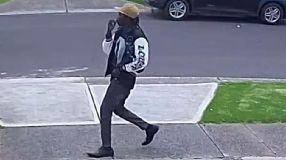 The man police would like to speak with was wearing a black and white varsity jacket, a brown cap, black shirt, and dark-coloured skinny jeans. Picture: VIC Police