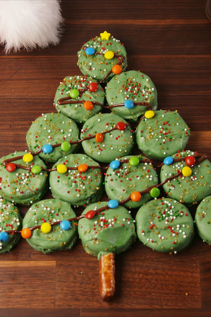 <p>This will make your holiday table feel festive and bright. Bonus: It's WAY easier to decorate than an actual tree, so get the kids involved.</p><p>Get the <strong><a href="https://www.delish.com/cooking/recipe-ideas/recipes/a57120/oreo-christmas-tree-recipe/" rel="nofollow noopener" target="_blank" data-ylk="slk:Oreo Christmas Tree recipe;elm:context_link;itc:0;sec:content-canvas" class="link ">Oreo Christmas Tree recipe</a></strong>.</p>