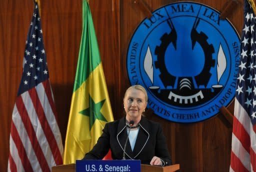 US Secretary of State Hillary Clinton speaks during a press conference at Dakar University on August 1. Clinton arrived in the Ugandan capital Kampala, which has been hit by an Ebola outbreak and where she will spend one night before heading to South Sudan