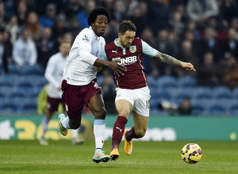 Burnley&#39;s Danny Ings, right, is tackled by Aston Villa&#39;s Carlos Sanchez battle for the ball during the English Premier League soccer match at Turf Moor, Burnley, England, Saturday Nov. 29, 2014. (AP Photo/PA, Clint Hughes) UNITED KINGDOM OUT