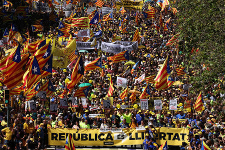 Pro-independence supporters march as they attend a demonstration in Barcelona, Spain, April 15, 2018. REUTERS/Albert Gea
