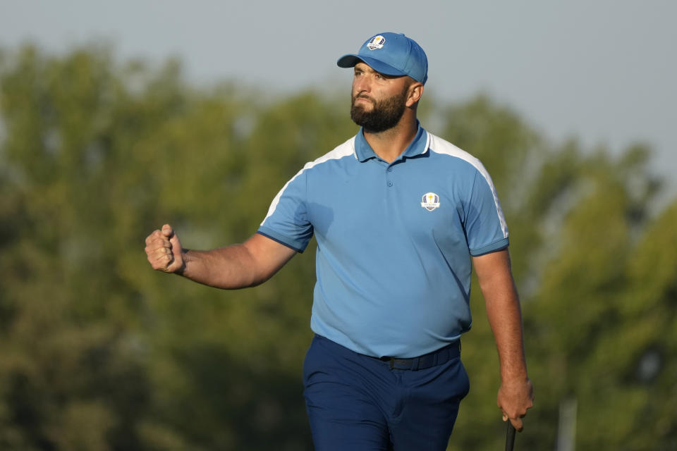 Europe's Jon Rahm celebrates after his putt on the 3rd green during his morning Foursome match at the Ryder Cup golf tournament at the Marco Simone Golf Club in Guidonia Montecelio, Italy, Friday, Sept. 29, 2023. (AP Photo/Alessandra Tarantino)